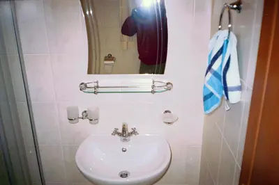 a bathroom with a sink and a mirror at Apartment Rutland Beach in Ravda