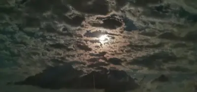 a cloudy sky with the sun in the middle at HomeLine Kazakovi in Nesebar