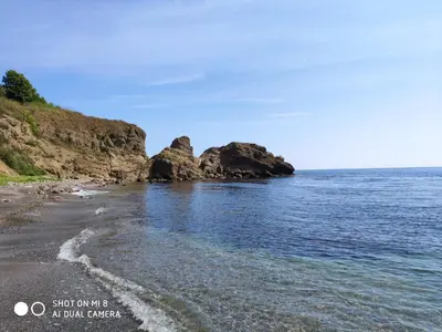 a beach with some rocks in the water at INESA in Tsarevo