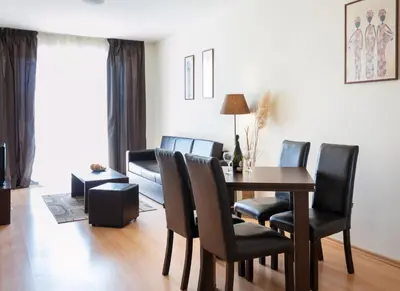 a dining room with a table and chairs at Charming 1 Bedroom Apartment for up to 4 Guests in Sunny Beach