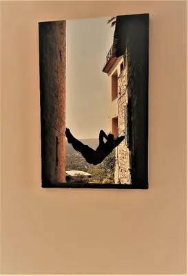 a person is jumping off of a building at Charming 1 Bedroom Apartment for up to 4 Guests in Sunny Beach