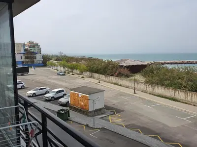 a view of a parking lot with cars parked at Таня 11 in Pomorie