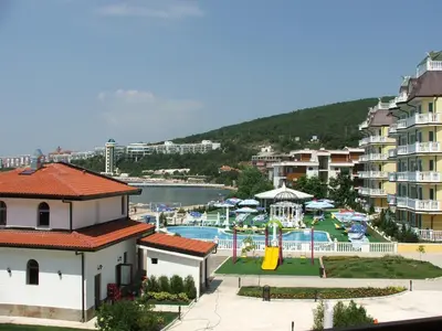 a view of a resort with a pool and buildings at Apartamens for rent at the beach bulgaria in Sveti Vlas