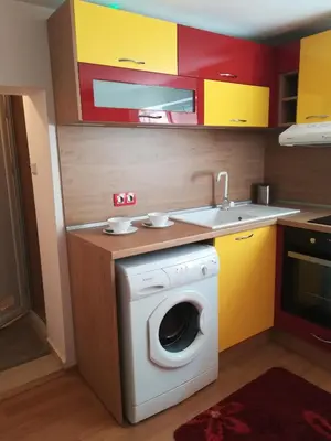 a kitchen with a washing machine and a sink at Studio Yana *Top location*Sea Garden* in Varna City