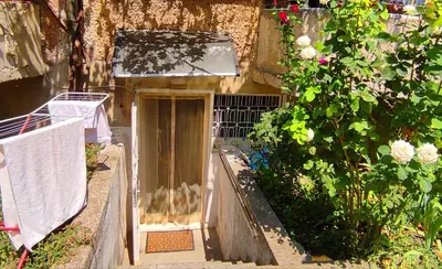 a door to a building with flowers on it at Studio Yana *Top location*Sea Garden* in Varna City