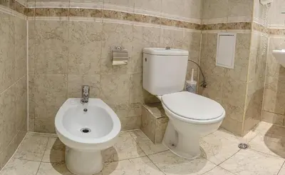 a bathroom with a toilet and a sink at Private Studio in Planet Hotel, Sunny Beach Center by Flаt Manаger in Sunny Beach