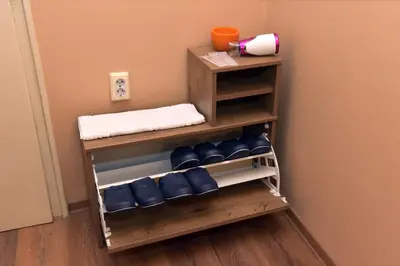 a pair of blue boxing gloves in a room at City apartments in Varna City