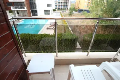a balcony with a view of a pool at Eden - Menada Apartments in Sunny Beach