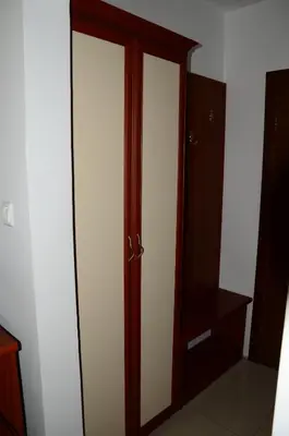 a pair of closet doors in a room at Kirovi House - guest rooms in Tsarevo