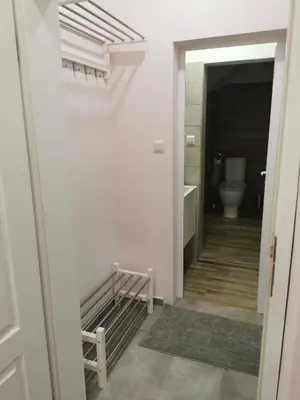 a bathroom with a toilet and a sink at Studio Thermi 1 in Varna City