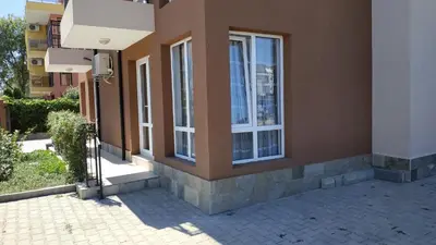 a building with windows on the side of it at Complex Argo in Ravda