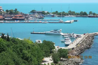 a group of boats docked in a harbor at Black Sea Apartment in Nesebar