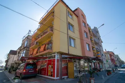 a building on the side of a street at Fener Guest House in Pomorie