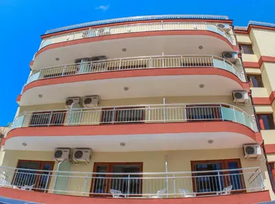 a building with balconies on the side of it at Hostel Malibu in Sunny Beach