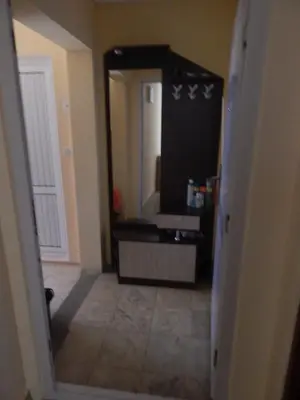 a hallway with a large mirror in a room at Dunav Apt.3 in Ravda