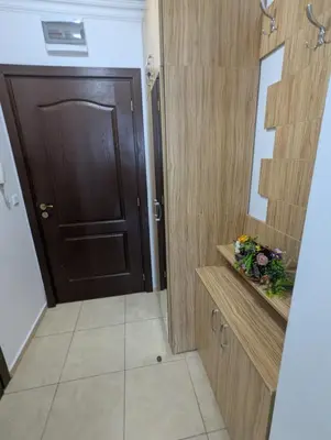 a bathroom with a black door and a mirror at FREGATA 15 Studio Sveti Vlas in Sveti Vlas