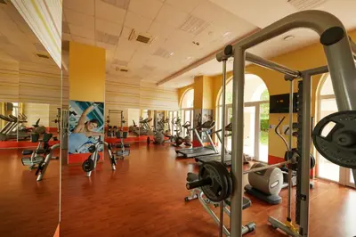 a gym with a lot of exercise equipment in a room at Dreams Sunny Beach Resort and Spa - Premium All Inclusive in Sunny Beach
