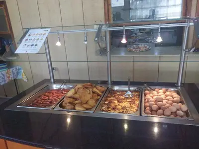 a buffet line with many different types of food at Hotel Amigos in Obzor