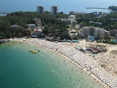 an aerial view of a beach with a crowd of people at Hotel Sigma in Kiten