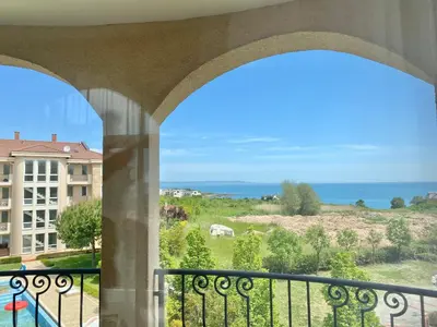 a view of the ocean from a balcony at Apartments in complex ATIA RESORT in Chernomorets