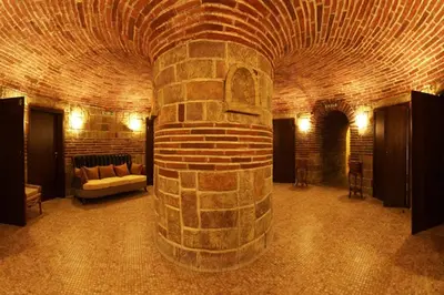 a room with a brick wall and a brick pillar at Generaator House in Aheloy
