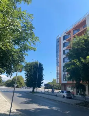 a car parked on a street next to a building at ApartHotel Asparuh Studio3 in Varna City