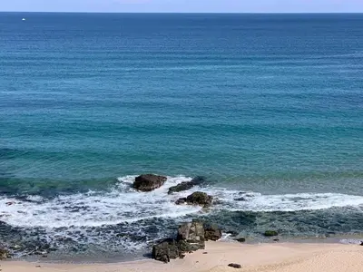an aerial view of a beach with rocks in the water at JI HOTEL in Sozopol