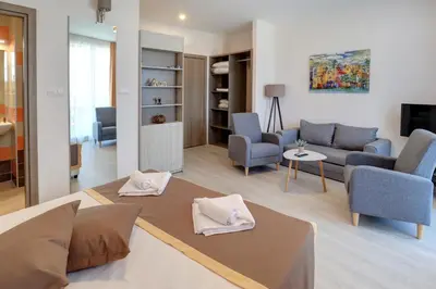 a living room with a couch and chairs and a table at Eco complex Zdravets near Varna in Zdravets