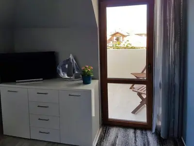 a room with a desk with a television and a window at SP Luxury Loft 28 in Ravda