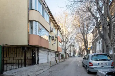 a car parked on a street next to a building at Blue Тerrace Apartment Top Center in Varna City