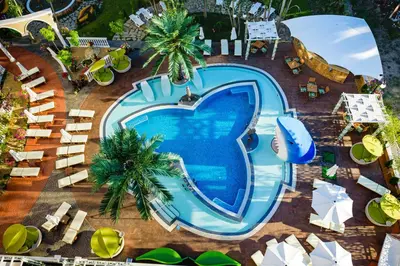 an overhead view of a swimming pool at a resort at Sweet Homes 6 Apartments in Sunny Beach