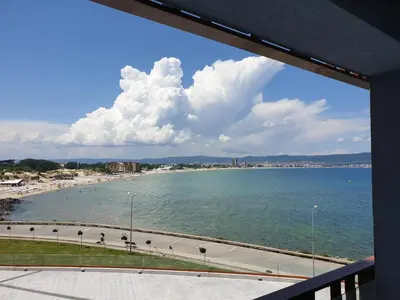 a view of a beach from a balcony at PARADISO 'В' 311 Private Studio Nesebar in Nesebar