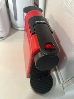 a red and black appliance sitting on a table at STUDIO KATRIN in Nesebar