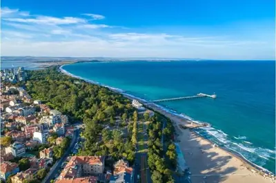 an aerial view of a beach and the ocean at Flower Street provides accommodations with free Wifi, air conditioning in Sunny Beach