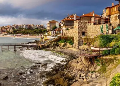 a view of a beach with a pier and buildings at Hotel Tm Deluxe located in Sunny Beach in Sunny Beach