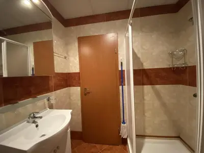 a bathroom with a shower and a sink and a shower at FORT NOKS NESSEBAR B2-216 Studio SUNNY BEACH in Sunny Beach
