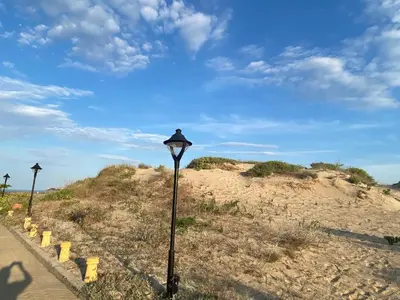 a street light on the side of a beach at FORT NOKS NESSEBAR B2-216 Studio SUNNY BEACH in Sunny Beach