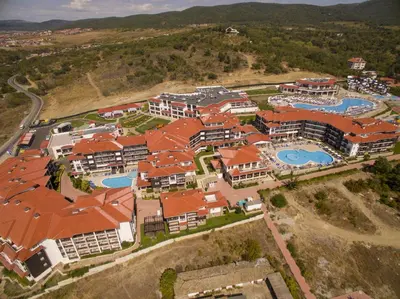 an aerial view of a resort with orange roofs at Nevis Resort & Aqua Park - All Inclusive in Sunny Beach