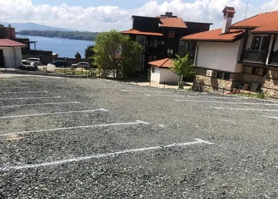 an empty parking lot in front of some houses at Solinaria Boutique Hotel in Sozopol