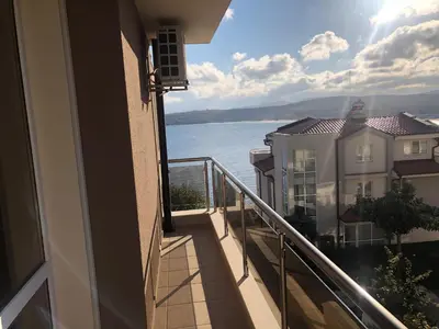a balcony of a building with a view of the water at Solinaria Boutique Hotel in Sozopol