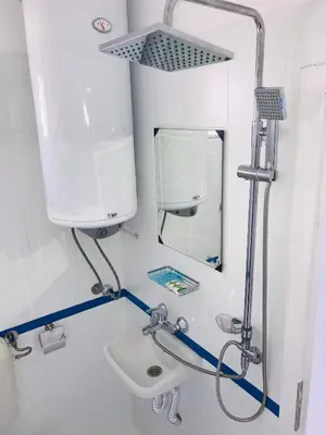a bathroom with a sink and a mirror at Къща Наде in Tsarevo