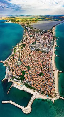 an aerial view of a city next to the water at Rent Apartments Martin Beach in Pomorie