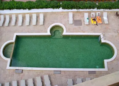 an overhead view of a swimming pool in a park at ТРОПИКАНА in Primorsko