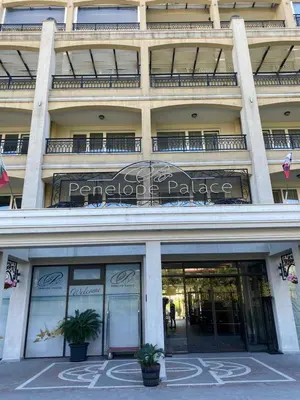 a store front of a building with a sign on it at Private Apartments by the sea with a large terrace in Apart hotel! in Pomorie