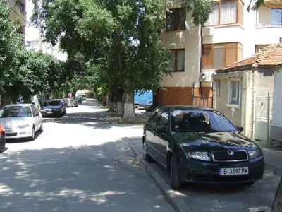 a car parked on the side of a street at Varnaflats Guest Rooms in Varna City