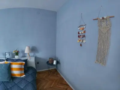 a blue room with a blue wall with a blue couch at Into The BLUE, 4 guests, 5 min away from the BEACH in Varna City