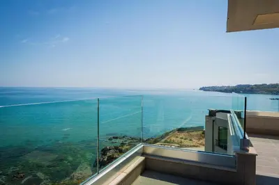 a view of the ocean from a house at Villa Flora in Sozopol