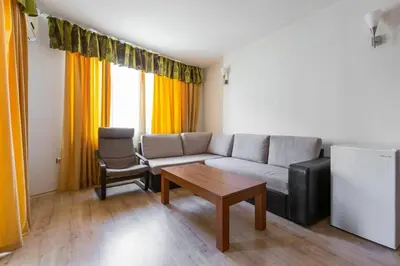 a living room with a couch and a coffee table at Avalon appartament da Lary in Sunny Beach
