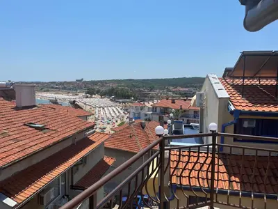 a view of a city from the balcony of a building at Time out in Sozopol