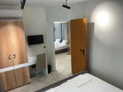 a room with a bedroom with a bed and a mirror at Hotel Pacific Palma in Sunny Beach